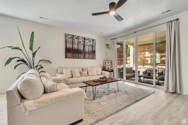 2103 N Elderberry Dr W Unit 222, Saratoga Springs, UT 84045 - living room featuring wood finished floors and ceiling fan