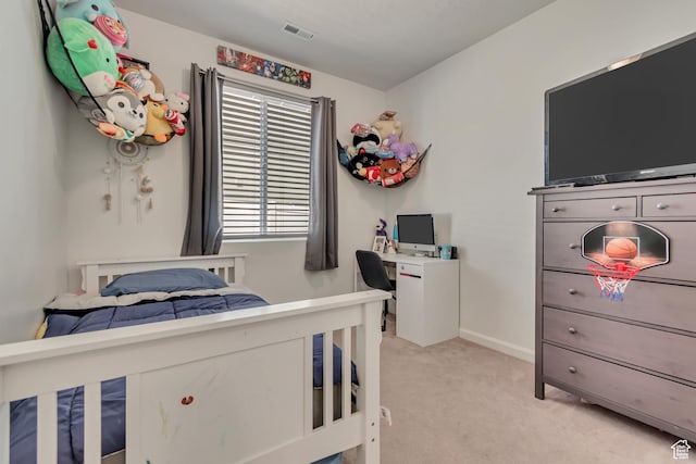 2103 N Elderberry Dr W Unit 222, Saratoga Springs, UT 84045 - bedroom with light carpet, a desk, and baseboards