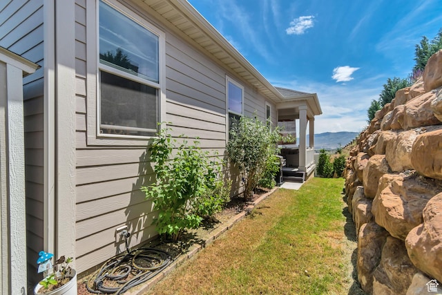 2103 N Elderberry Dr W Unit 222, Saratoga Springs, UT 84045 - view of green lawn featuring a mountain view