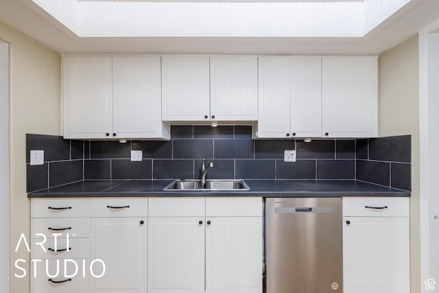 162 E 3000 S, Bountiful, UT 84010 - kitchen featuring stainless steel dishwasher, a sink, dark countertops, decorative backsplash, and white cabinets