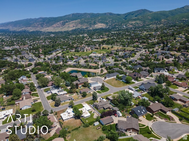 162 E 3000 S, Bountiful, UT 84010 - aerial view of property and surrounding area with mountains and nearby suburban area