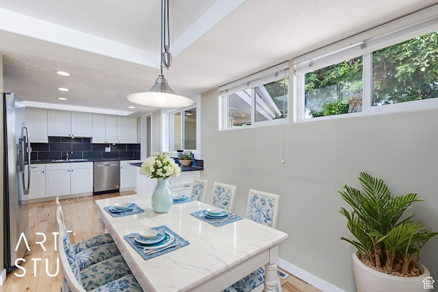 162 E 3000 S, Bountiful, UT 84010 - dining space featuring light wood-style floors, recessed lighting, and baseboards