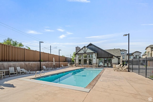 261 E Sage Canal Way, Sandy, UT 84070 - community pool with a patio area
