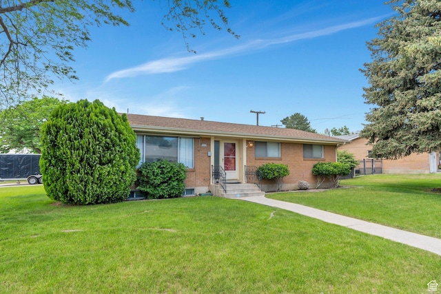 1031 N 1750 W, Provo, UT 84604 - ranch-style house with a front lawn and brick siding