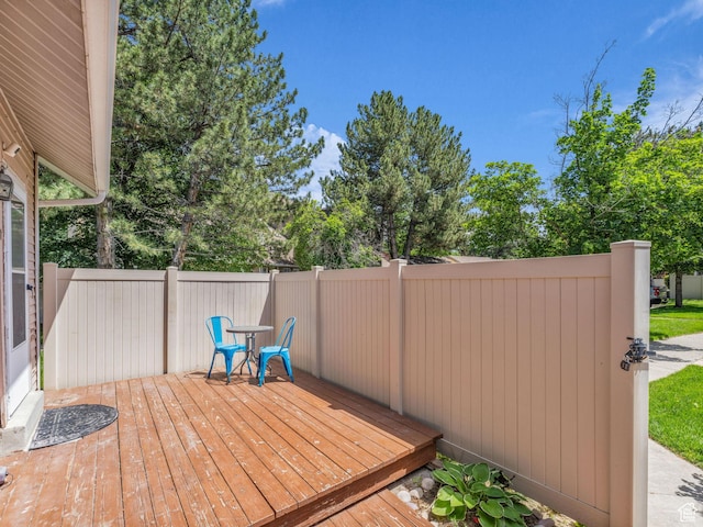 648 E 6870 S, Midvale, UT 84047 - wooden terrace featuring view of wooded area