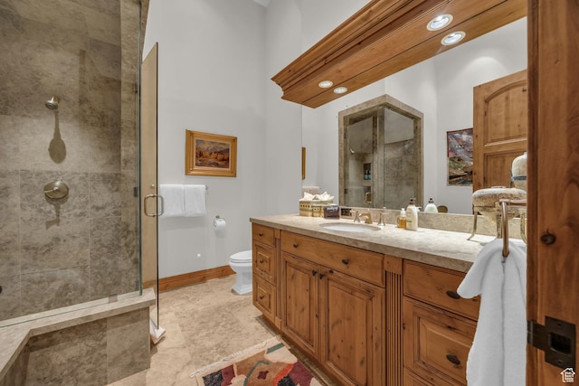 9968 Summit View Dr, Heber City, UT 84032 - bathroom with a stall shower, toilet, vanity, and baseboards