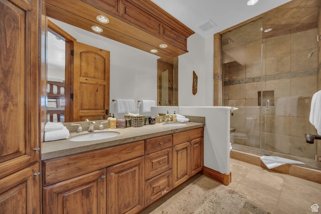 9968 Summit View Dr, Heber City, UT 84032 - bathroom featuring double vanity, a stall shower, and recessed lighting