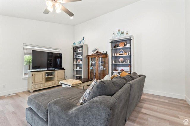 116 E 970 N, Santaquin, UT 84655 - living room featuring a ceiling fan, light wood-type flooring, and baseboards