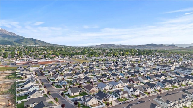 116 E 970 N, Santaquin, UT 84655 - aerial overview of property's location with a mountain backdrop and nearby suburban area