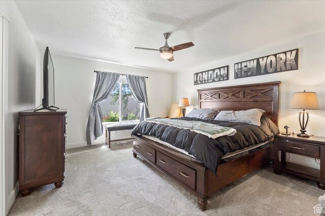 116 E 970 N, Santaquin, UT 84655 - bedroom with light colored carpet, a textured ceiling, ceiling fan, and baseboards