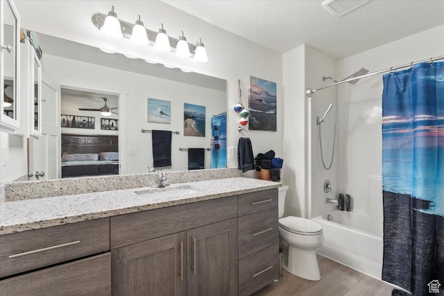 116 E 970 N, Santaquin, UT 84655 - full bath featuring ensuite bathroom, wood finished floors, ceiling fan, vanity, and shower / bath combo with shower curtain