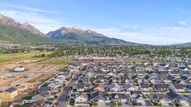 116 E 970 N, Santaquin, UT 84655 - aerial view of property's location featuring a mountain backdrop and nearby suburban area