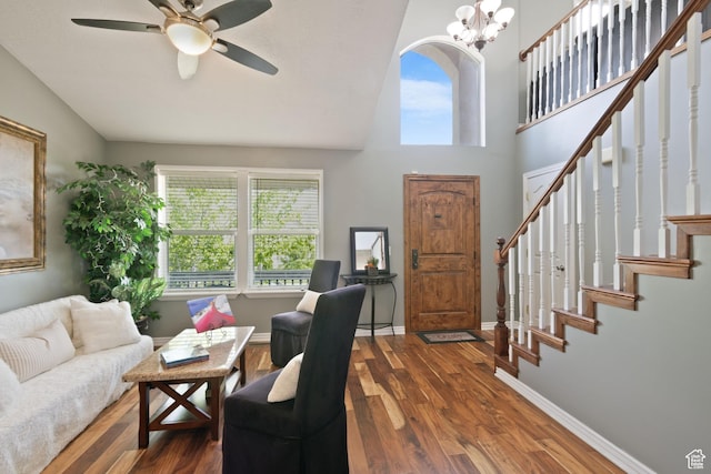 468 E Brewster, Draper, UT 84020 - living area with wood finished floors, ceiling fan, stairway, baseboards, and high vaulted ceiling