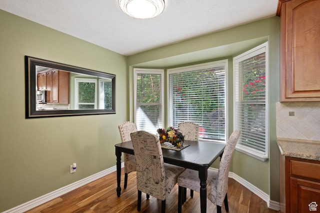 468 E Brewster, Draper, UT 84020 - dining room featuring baseboards and dark wood-style floors