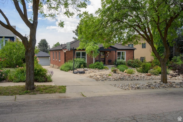 2366 E Logan Way, Salt Lake City, UT 84108 - single story home with brick siding, a garage, an outbuilding, and a tiled roof