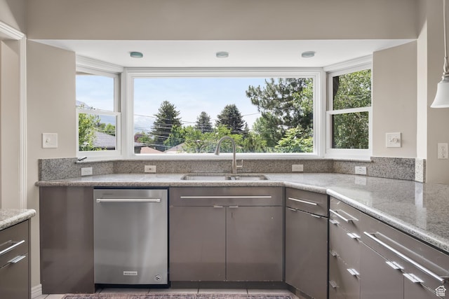 2366 E Logan Way, Salt Lake City, UT 84108 - kitchen with a sink, stainless steel dishwasher, gray cabinets, and light stone counters