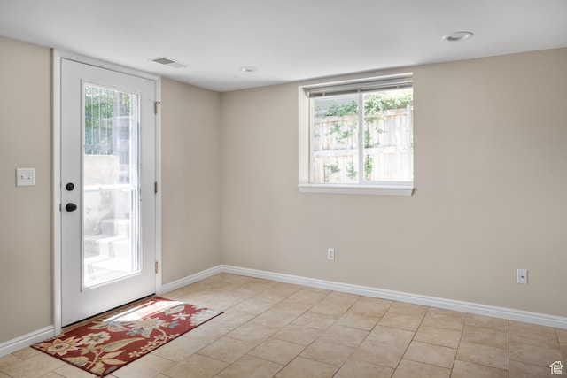 2366 E Logan Way, Salt Lake City, UT 84108 - doorway with baseboards and light tile patterned floors
