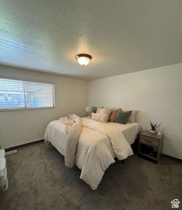 237 W 310 N, Orem, UT 84057 - carpeted bedroom featuring a textured ceiling and baseboards