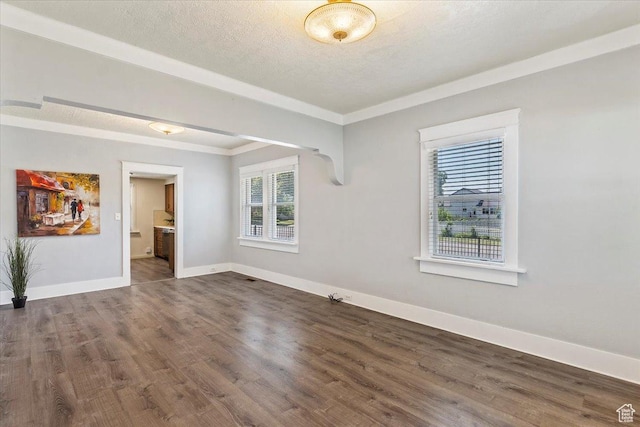 106 N 400 E, Kaysville, UT 84037 - spare room with wood finished floors, a textured ceiling, and crown molding