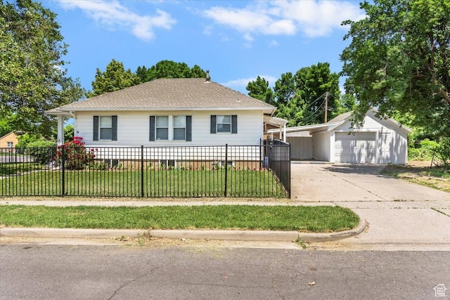 106 N 400 E, Kaysville, UT 84037 - view of front of property with driveway, a fenced front yard, a garage, and roof with shingles