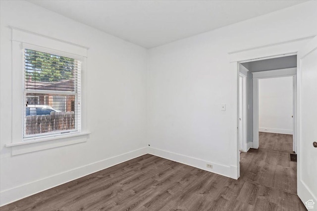 106 N 400 E, Kaysville, UT 84037 - spare room with dark wood-type flooring and baseboards