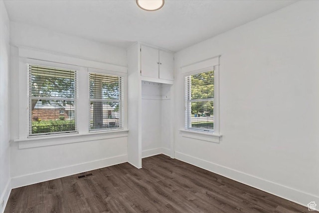 106 N 400 E, Kaysville, UT 84037 - unfurnished room with baseboards and dark wood-type flooring