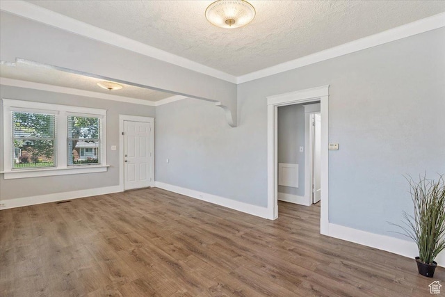 106 N 400 E, Kaysville, UT 84037 - spare room with a textured ceiling, wood finished floors, and ornamental molding