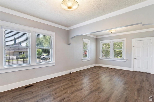106 N 400 E, Kaysville, UT 84037 - empty room with dark wood-type flooring, a textured ceiling, and crown molding
