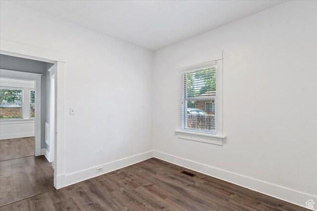 106 N 400 E, Kaysville, UT 84037 - empty room with healthy amount of natural light and dark wood-style floors