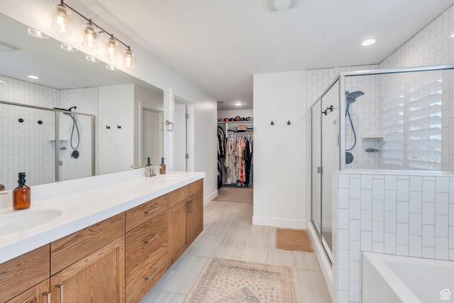 162 W 350 N, Vineyard, UT 84059 - full bath featuring a shower stall, double vanity, a spacious closet, a bath, and recessed lighting