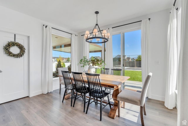 162 W 350 N, Vineyard, UT 84059 - dining space featuring a chandelier, light wood-style floors, and baseboards
