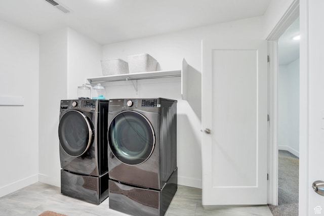 162 W 350 N, Vineyard, UT 84059 - laundry area featuring washing machine and clothes dryer and baseboards