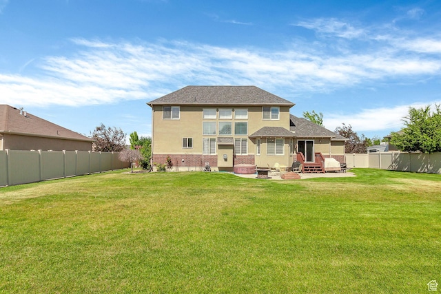 2733 S 1415 W, Syracuse, UT 84075 - back of house with entry steps, stucco siding, brick siding, a patio, and a shingled roof