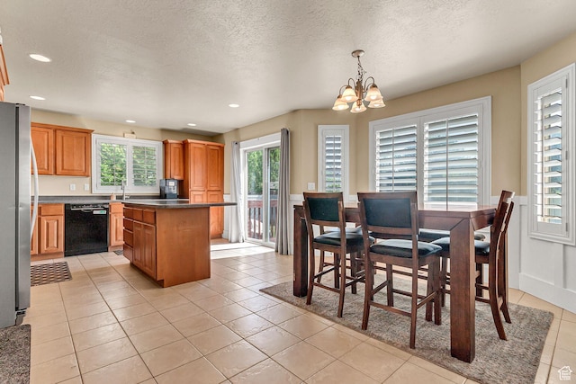 2733 S 1415 W, Syracuse, UT 84075 - dining area with a chandelier, light tile patterned floors, recessed lighting, and a textured ceiling