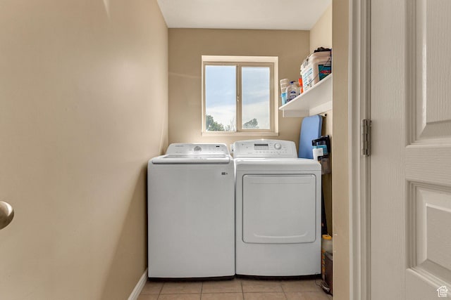 2733 S 1415 W, Syracuse, UT 84075 - washroom featuring washer and dryer, light tile patterned flooring, and baseboards