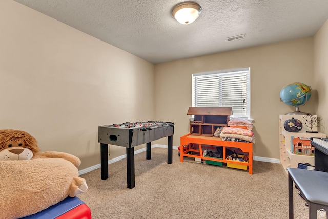 2733 S 1415 W, Syracuse, UT 84075 - rec room with carpet, a textured ceiling, and baseboards