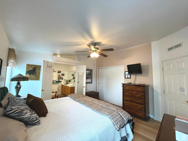 870 S 100 E, Wellington, UT 84542 - bedroom with light wood finished floors and a ceiling fan