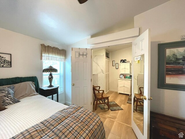 870 S 100 E, Wellington, UT 84542 - bedroom with light wood-style floors and lofted ceiling