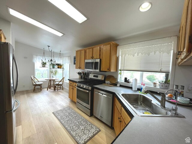 870 S 100 E, Wellington, UT 84542 - kitchen with appliances with stainless steel finishes, a sink, brown cabinetry, and recessed lighting
