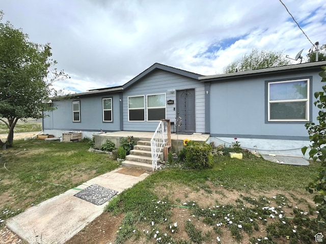 870 S 100 E, Wellington, UT 84542 - view of front facade featuring a front yard