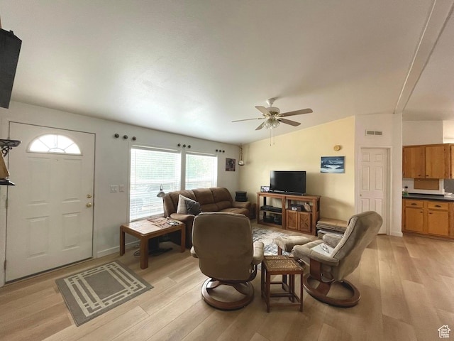 870 S 100 E, Wellington, UT 84542 - living room featuring light wood-style floors, lofted ceiling, and ceiling fan