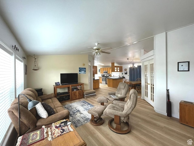 870 S 100 E, Wellington, UT 84542 - living area with light wood finished floors, ceiling fan, french doors, and radiator heating unit