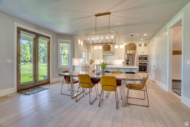 500 W Cascade Pkwy, Midway, UT 84049 - dining space with light wood finished floors, baseboards, plenty of natural light, and recessed lighting