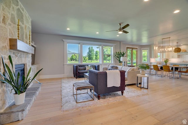 500 W Cascade Pkwy, Midway, UT 84049 - living area featuring a fireplace, a ceiling fan, light wood-style floors, baseboards, and recessed lighting