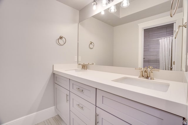 500 W Cascade Pkwy, Midway, UT 84049 - bathroom featuring double vanity and baseboards