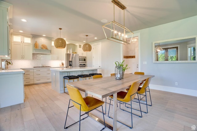 500 W Cascade Pkwy, Midway, UT 84049 - dining room featuring light wood-style flooring, recessed lighting, a chandelier, and baseboards