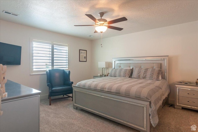 1123 S 4150 W, West Point, UT 84015 - bedroom with light carpet, a textured ceiling, and a ceiling fan