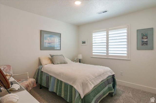 1123 S 4150 W, West Point, UT 84015 - bedroom featuring carpet, a textured ceiling, and baseboards