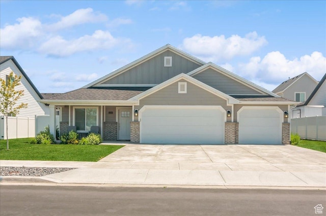 1123 S 4150 W, West Point, UT 84015 - craftsman-style house with an attached garage, board and batten siding, brick siding, and concrete driveway