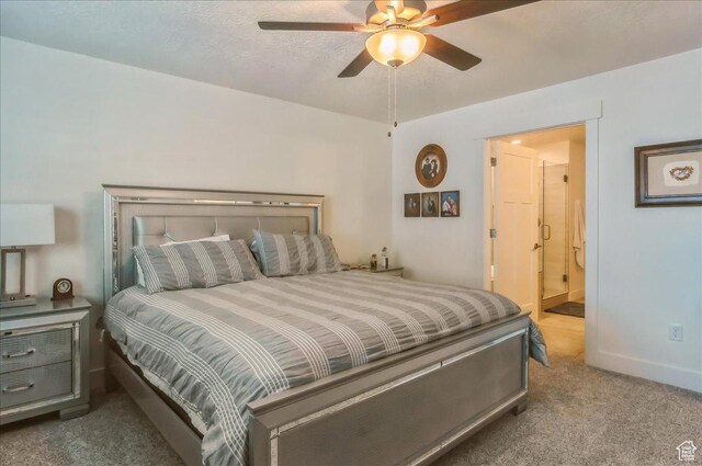 1123 S 4150 W, West Point, UT 84015 - bedroom with carpet, connected bathroom, ceiling fan, and baseboards